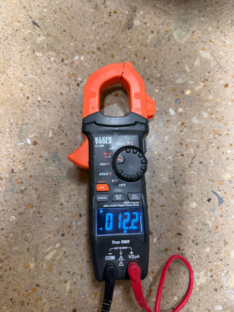 Klein Tools clamp meter used to test voltage before ordering an electric pottery kiln
